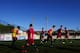 FILE - In this Jan. 8, 2011 file photo, Barcelona youth players from 'La Masia' football academy warm up at the Barcelona FC's Joan Gamper training camp in San Joan Despi, Spain. The Court of Arbitration for Sport on Tuesday Dec. 30, 2014 dismissed Barcelona's appeal and upheld the transfer ban FIFA imposed on the club for infringing regulations on registering minors as youth players. CAS said in a statement that “Barcelona had breached the rules regarding the protection of minors and the registration of minors attending football academies.” The ruling means Barcelona will be barred from signing any players in 2015. Barcelona is renowned for training and educating young players such as Lionel Messi and Andres Iniesta at it's La Masia academy, in the hope they develop the talent to graduate to the senior team. (AP Photo/Manu Fernandez, File)