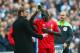 LONDON, ENGLAND - FEBRUARY 28: Jurgen Klopp, manager of Liverpool talks to an injured Mamadou Sakho during the Capital One Cup Final match between Liverpool and Manchester City at Wembley Stadium on February 28, 2016 in London, England. (Photo by Clive Brunskill/Getty Images)