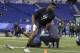 Oklahoma State defensive lineman Emmanuel Ogbah runs a drill at the NFL football scouting combine on Sunday, Feb. 28, 2016, in Indianapolis. (AP Photo/Darron Cummings)