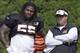 Cincinnati Bengals outside linebacker Vontaze Burfict (55) talks with defensive coordinator Paul Guenther during practice at the NFL football team's training camp, Thursday, July 31, 2014, in Cincinnati. (AP Photo/Al Behrman)