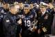 Navy quarterback Keenan Reynolds (19) holds a trophy after being named Most Valuable Player after the Military Bowl NCAA college football game against Pittsburgh, Monday, Dec. 28, 2015, in Annapolis, Md. Navy won 44-28. (AP Photo/Patrick Semansky)