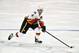 SUNRISE, FL - NOVEMBER 10: Kris Russell #4 of the Calgary Flames skates with the puck during a NHL game against the Florida Panthers at the BB&T Center on November 10, 2015 in Sunrise, Florida. (Photo by Ronald C. Modra/NHL/Getty Images)