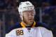 NEW YORK, NY - NOVEMBER 01: Jamie McGinn #88 of the Buffalo Sabres skates against the New York Islanders at the Barclays Center on November 1, 2015 in the Brooklyn borough of New York City. The Sabres defeated the Islanders 2-1. (Photo by Bruce Bennett/Getty Images)