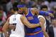 New York Knicks' Carmelo Anthony, right, hugs Charlotte Hornets' Jeremy Lin after an NBA basketball game in Charlotte, N.C., Wednesday, Nov. 11, 2015. The Hornets won 95-93. (AP Photo/Chuck Burton)