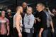 TORRANCE, CA - FEBRUARY 24: UFC featherweight champion Conor McGregor (L) and lightweight contender Nate Diaz (R) are held apart by Dave Sholler (C), UFC vice president of public relations, after a news conference at UFC Gym February 24, 2016, in Torrance, California. (Photo by Kevork Djansezian/Getty Images)