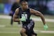 Ohio State linebacker Darron Lee runs a drill at the NFL football scouting combine on Sunday, Feb. 28, 2016, in Indianapolis. (AP Photo/Darron Cummings)