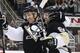 Pittsburgh Penguins' Patric Hornqvist, left, celebrates his third goal of an NHL hockey game against the Arizona Coyotes with teammate Phil Kessel (81) during the second period in Pittsburgh, Monday, Feb. 29, 2016. (AP Photo/Gene J. Puskar)