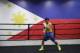Boxer Manny Pacquiao, of the Philippines, works out near a Philippines flag at Wild Card Boxing Club, Monday, April 27, 2015, in Los Angeles. Pacquiao is scheduled to fight Floyd Mayweather Jr. in a welterweight boxing match in Las Vegas on Saturday. (AP Photo/Jae C. Hong)
