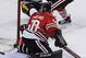 Nashville Predators right wing Viktor Arvidsson (38) scores a goal on Chicago Blackhawks goalie Corey Crawford (50) during the second period of an NHL hockey game Thursday, Feb. 25, 2016, in Chicago. (AP Photo/David Banks)