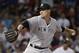 New York Yankees reliever Andrew Miller winds up for a pitch during the ninth inning of a baseball game against the Boston Red Sox, Tuesday, Sept. 1, 2015, at Fenway Park, in Boston. The Yankees won 3-1. (AP Photo/Steven Senne)