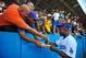 Cuban MLB player Yasiel Puig (R) signs autographs at the Latin American Stadium in Havana, on December 16, 2015. Cuban baseball stars Jose Abreu and Yasiel Puig returned home Tuesday for the first time since defecting to join the American big leagues, part of an unprecedented Major League Baseball tour made possible by the thaw in US-Cuban relations. The delegation also includes Cuban-born player Alexei Ramirez, a free agent who left Cuba legally by marrying a Dominican in 2007. AFP PHOTO/YAMIL LAGE / AFP / YAMIL LAGE (Photo credit should read YAMIL LAGE/AFP/Getty Images)