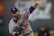 Los Angeles Dodgers starting pitcher Brett Anderson (35) works against the Colorado Rockies in the first inning of a baseball game Saturday, Sept. 26, 2015, in Denver. (AP Photo/David Zalubowski)