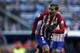 Atletico's Antoine Griezmann celebrates after scoring the opening goal during a Spanish La Liga soccer match between Real Madrid and Atletico Madrid at the Santiago Bernabeu stadium in Madrid, Saturday Feb. 27, 2016. (AP Photo/Oscar del Pozo)