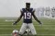 New England Patriots wide receiver Brandon LaFell kneels before an NFL divisional playoff football game against the Kansas City Chiefs, Saturday, Jan. 16, 2016, in Foxborough, Mass. (AP Photo/Elise Amendola)