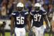 Nov 9, 2015; San Diego, CA, USA; San Diego Chargers inside linebacker Donald Butler (56) and outside linebacker Jeremiah Attaochu (97) react during the third quarter against the Chicago Bears at Qualcomm Stadium. Mandatory Credit: Jake Roth-USA TODAY Sports