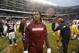 Washington Redskins quarterback Robert Griffin III walks around the field after an NFL football game against the Chicago Bears, Sunday, Dec. 13, 2015, in Chicago. The Redskins won 24-21. (AP Photo/Charles Rex Arbogast)