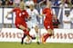 United States' Mallory Pugh, center, is sandwiched between the defense of England's Gilly Rafferty (6) and Lucy Bronze during the first half of a SheBelieves Cup women's soccer match Thursday, March 3, 2016, in Tampa, Fla. (AP Photo/Mike Carlson)