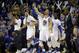 Golden State Warriors' Stephen Curry (30) celebrates with teammates as his team jumps ahead of the Oklahoma City Thunder during the second half of an NBA basketball game Thursday, March 3, 2016, in Oakland, Calif. Golden State won 121-106. (AP Photo/Marcio Jose Sanchez)