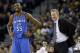 Oklahoma City Thunder's Kevin Durant (35) smiles next to Golden State Warriors head coach Steve Kerr during the first half of an NBA basketball game Thursday, March 3, 2016, in Oakland, Calif. (AP Photo/Marcio Jose Sanchez)