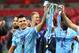 LONDON, ENGLAND - FEBRUARY 28: Sergio Aguero of Manchester City and team mate Pablo Zabaleta celebrate victory with the trophy after the Capital One Cup Final match between Liverpool and Manchester City at Wembley Stadium on February 28, 2016 in London, England. Manchester City win 3-1 on penalties. (Photo by Clive Brunskill/Getty Images)