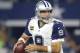Dallas Cowboys' Tony Romo (9) drops back to pass during an NFL football game against the Carolina Panthers, Thursday, Nov. 26, 2015, in Arlington, Texas. (AP Photo/Brandon Wade)