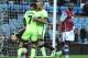 Manchester City’s Fabian Delph, center right, congratulates teammate Raheem Sterling after he scored against Aston Villa during the English FA Cup fourth round soccer match between Aston Villa and Manchester City at Villa Park in Birmingham, England, Saturday, Jan. 30, 2016. (AP Photo/Rui Vieira)
