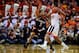 CHARLOTTESVILLE, VA - MARCH 05: Devon Hall #0 of the Virginia Cavaliers handles the ball against Quentin Snider #2 of the Louisville Cardinals in the first half during their game at John Paul Jones Arena on March 5, 2016 in Charlottesville, Virginia. (Photo by Patrick McDermott/Getty Images)