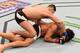 LAS VEGAS, NV - MARCH 05: Nordine Taleb of France (top) punches Erick Silva of Brazil in their welterweight bout during the UFC 196 event inside MGM Grand Garden Arena on March 5, 2016 in Las Vegas, Nevada. (Photo by Josh Hedges/Zuffa LLC/Zuffa LLC via Getty Images)
