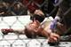 Conor McGregor recovers shortly after a second round-submission to Nate Diaz during their UFC 196 welterweight mixed martial arts match, Saturday, March 5, 2016, in Las Vegas. (AP Photo/Eric Jamison)