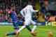 Liverpool's Zaire-born Belgian striker Christian Benteke (R) is fouled in the area by Crystal Palace's Irish defender Damien Delaney leading to a penalty that Benteke converts during the English Premier League football match between Crystal Palace and Liverpool at Selhurst Park in south London on March 6, 2016.
Liverpool won the game 2-1. / AFP / GLYN KIRK / RESTRICTED TO EDITORIAL USE. No use with unauthorized audio, video, data, fixture lists, club/league logos or 'live' services. Online in-match use limited to 75 images, no video emulation. No use in betting, games or single club/league/player publications. / (Photo credit should read GLYN KIRK/AFP/Getty Images)