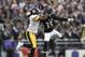 Baltimore Ravens defensive back Shareece Wright (35) breaks up a pass intended for Pittsburgh Steelers wide receiver Markus Wheaton (11) during the second half of an NFL football game in Baltimore, Sunday, Dec. 27, 2015. The Ravens defeated the Steelers 20-17. (AP Photo/Gail Burton)