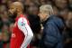 Arsenal's French player Thierry Henry (L) stands next to manager Arsene Wenger as he prepares to substitute for a team-mate during the third round FA Cup football match between Arsenal and Leeds United at The Emirates Stadium in London, on January 9, 2012. AFP PHOTO/IAN KINGTON
RESTRICTED TO EDITORIAL USE. No use with unauthorised audio, video, data, fixture lists, club/league logos or 'live' services. Online in-match use limited to 45 images, no video emulation. No use in betting, games or single club/league/player publications. (Photo credit should read IAN KINGTON/AFP/Getty Images)
