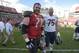 Tampa Bay Buccaneers guard Logan Mankins (70) and Chicago Bears offensive tackle Kyle Long (75) chat on the field after an NFL football game in Tampa, Fla., Sunday, Dec. 27, 2015. The Bears won 26-21. (AP Photo/Phelan M. Ebenhack)