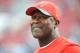 TAMPA, FL - NOVEMBER 15: Head coach Lovie Smith of the Tampa Bay Buccaneers watches pregame warmup before the game against the Dallas Cowboys at Raymond James Stadium on November 15, 2015 in Tampa, Florida. (Photo by Cliff McBride/Getty Images)