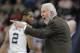 San Antonio Spurs head coach Gregg Popovich, right, argues a call during the first half of an NBA basketball game against the Detroit Pistons, Wednesday, March 2, 2016, in San Antonio. (AP Photo/Eric Gay)