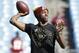Washington Redskins' Robert Griffin III warms up before an NFL football game against the Carolina Panthers in Charlotte, N.C., Sunday, Nov. 22, 2015. (AP Photo/Bob Leverone)