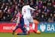 LONDON, ENGLAND - MARCH 06: The knee of Damien Delaney of Crystal Palace catches the foot of Christian Benteke of Liverpool and a penalty is given during the Barclays Premier League match between Crystal Palace and Liverpool at Selhurst Park on March 6, 2016 in London, England. (Photo by Catherine Ivill - AMA/Getty Images)