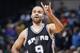 INDIANAPOLIS, IN - MARCH 7: Tony Parker #9 of the San Antonio Spurs gestures during action against the Indiana Pacers in the first half of the game at Bankers Life Fieldhouse on March 7, 2016 in Indianapolis, Indiana. NOTE TO USER: User expressly acknowledges and agrees that, by downloading and or using the photograph, User is consenting to the terms and conditions of the Getty Images License Agreement. (Photo by Joe Robbins/Getty Images)