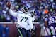 Jan 10, 2016; Minneapolis, MN, USA; Seattle Seahawks defensive tackle Ahtyba Rubin (77) celebrates after a recovered fumble against the Minnesota Vikings in the fourth quarter of a NFC Wild Card playoff football game at TCF Bank Stadium. Mandatory Credit: Brace Hemmelgarn-USA TODAY Sports