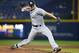 Miami Marlins relief pitcher Carter Capps (22) delivers in the eighth inning of a baseball game against the Atlanta Braves Monday, April 13, 2015, in Atlanta. The Braves won the game 3-2. (AP Photo/Todd Kirkland)