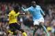MANCHESTER, ENGLAND - MARCH 05: Yaya Toure of Manchester City and Idrissa Gueye of Aston Villa compete for the ball during the Barclays Premier League match between Manchester City and Aston Villa at Etihad Stadium on March 5, 2016 in Manchester, England. (Photo by Laurence Griffiths/Getty Images)