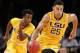 FILE - In this Nov. 24, 2015, file photo, LSU forward Ben Simmons (25) drives downcourt as teammate Antonio Blakeney (2) follows in the first half of an NCAA college basketball game against North Carolina State in New York. For all of his gaudy numbers, Simmons is still trying to figure out the best way to put the Tigers in position to win. And now the schedule gets harder, starting with Tuesday night's, Dec. 29, 2015, tilt against Wake Forest, followed by the opening of Southeastern Conference play against Vanderbilt and No. 10 Kentucky. (AP Photo/Kathy Willens, File)
