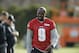 Philadelphia Eagles quarterback Thad Lewis walks off the field at the NFL football team's practice facility, Tuesday, Dec. 15, 2015, in Philadelphia. (AP Photo/Matt Rourke)