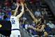 Mar 9, 2016; Kansas City, MO, USA; Kansas State Wildcats forward Dean Wade (32) shoots the ball as Oklahoma State Cowboys guard Tavarius Shine (5) defends during the Big 12 Conference tournament at Sprint Center. Mandatory Credit: Denny Medley-USA TODAY Sports