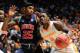 Mar 9, 2016; Nashville, TN, USA; Tennessee Volunteers forward Armani Moore (4) keeps the ball away from Auburn Tigers forward Jordon Granger (25) during game one of the SEC Tournament at Bridgestone Arena. Mandatory Credit: Joshua Lindsey-USA TODAY Sports