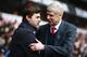 LONDON, ENGLAND - MARCH 05: Arsene Wenger manager of Arsenal and Mauricio Pochettino manager of Tottenham Hotspur shake hands prior to the Barclays Premier League match between Tottenham Hotspur and Arsenal at White Hart Lane on March 5, 2016 in London, England. (Photo by Paul Gilham/Getty Images)