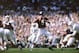 American professional football player Bill Wade #9, quarterback of the Chicago Bears, prepares to pass the ball during a game against the Baltimore Colts, Chicago, October 6, 1963. The Bears won 10 - 3. (Photo by Robert Riger/Getty Images)
