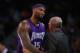 OAKLAND, CA - DECEMBER 28: DeMarcus Cousins #15 of the Sacramento Kings is consoled by George Karl of the Sacramento Kings after being taken out of the game after he picked up his third foul against the Golden State Warriors at ORACLE Arena on December 28, 2015 in Oakland, California. NOTE TO USER: User expressly acknowledges and agrees that, by downloading and or using this photograph, User is consenting to the terms and conditions of the Getty Images License Agreement. (Photo by Ezra Shaw/Getty Images)