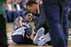 Memphis Grizzlies guard Mario Chalmers lays on the court as he has is right leg examined during the third quarter of an NBA basketball game against the Boston Celtics in Boston, Wednesday, March 9, 2016. Chalmers left the game after the injury. (AP Photo/Charles Krupa)