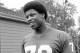 FILE - This is an Aug. 15, 1978, file photo showing New York Giants defensive end Gary Jeter, in New York. Gary Jeter, a defensive lineman who played for the Giants and Rams during a 13-year NFL career, has died. He was 61. The NFL Players Association said it was informed he died Wednesday, March 9, 2016. No cause or other details were given. Jeter was drafted out of Southern California in 1977 by the New York Giants with the fifth overall selection. He played six seasons for them, then another six for the Rams and one in New England. (AP Photo/G. Paul Burnett, File)